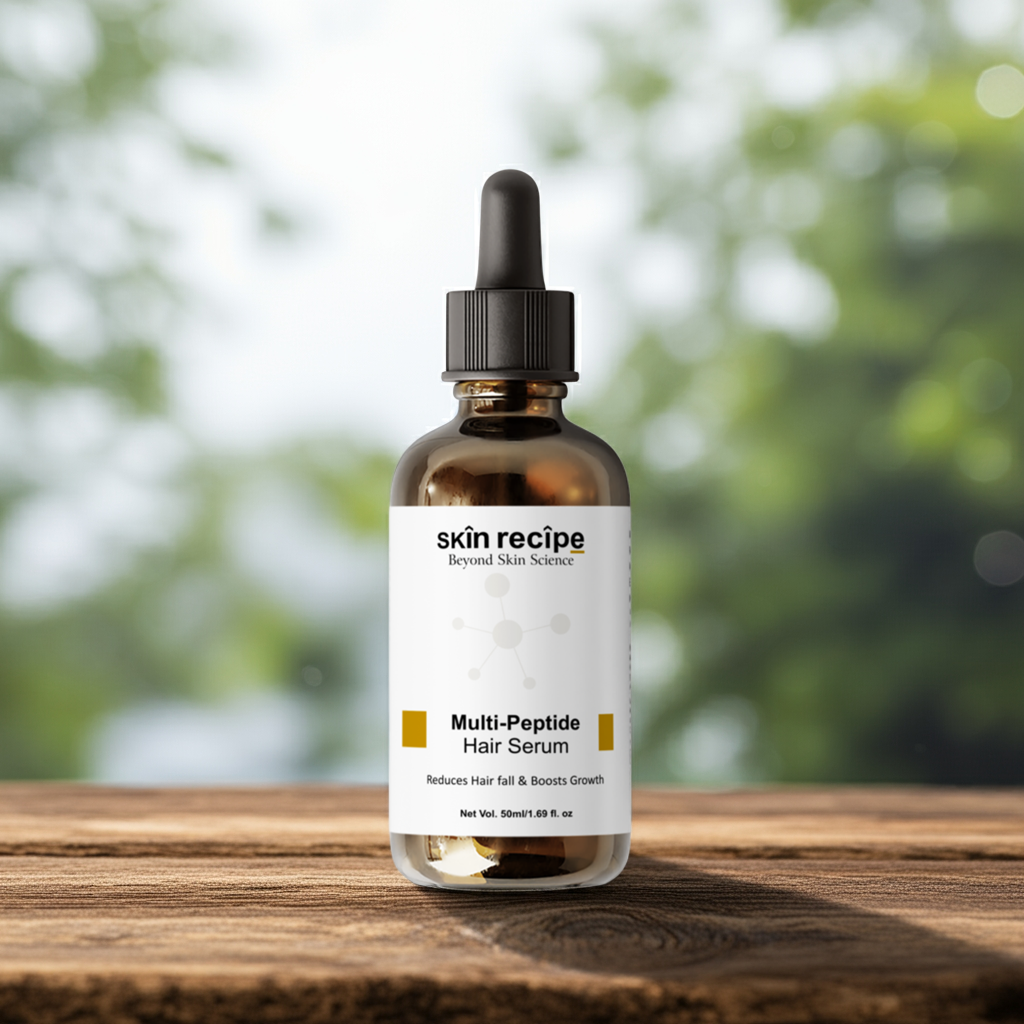 Bottle of skin recipe Multi-Peptide Hair Serum on a wooden surface with a blurred green background